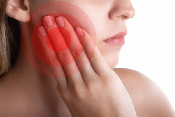 Como amenizar a dor de dente inflamado?